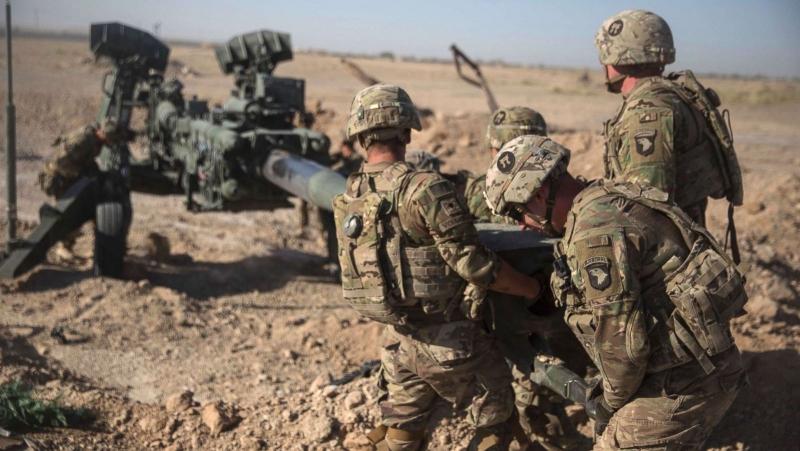 D. Trampas: JAV kariai iki šių Kalėdų paliks Afganistaną